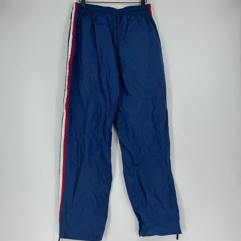 Vtg 90s Nike Kids Blue Nylon Track‎ Pants with Red White Stripe Accent XL READ